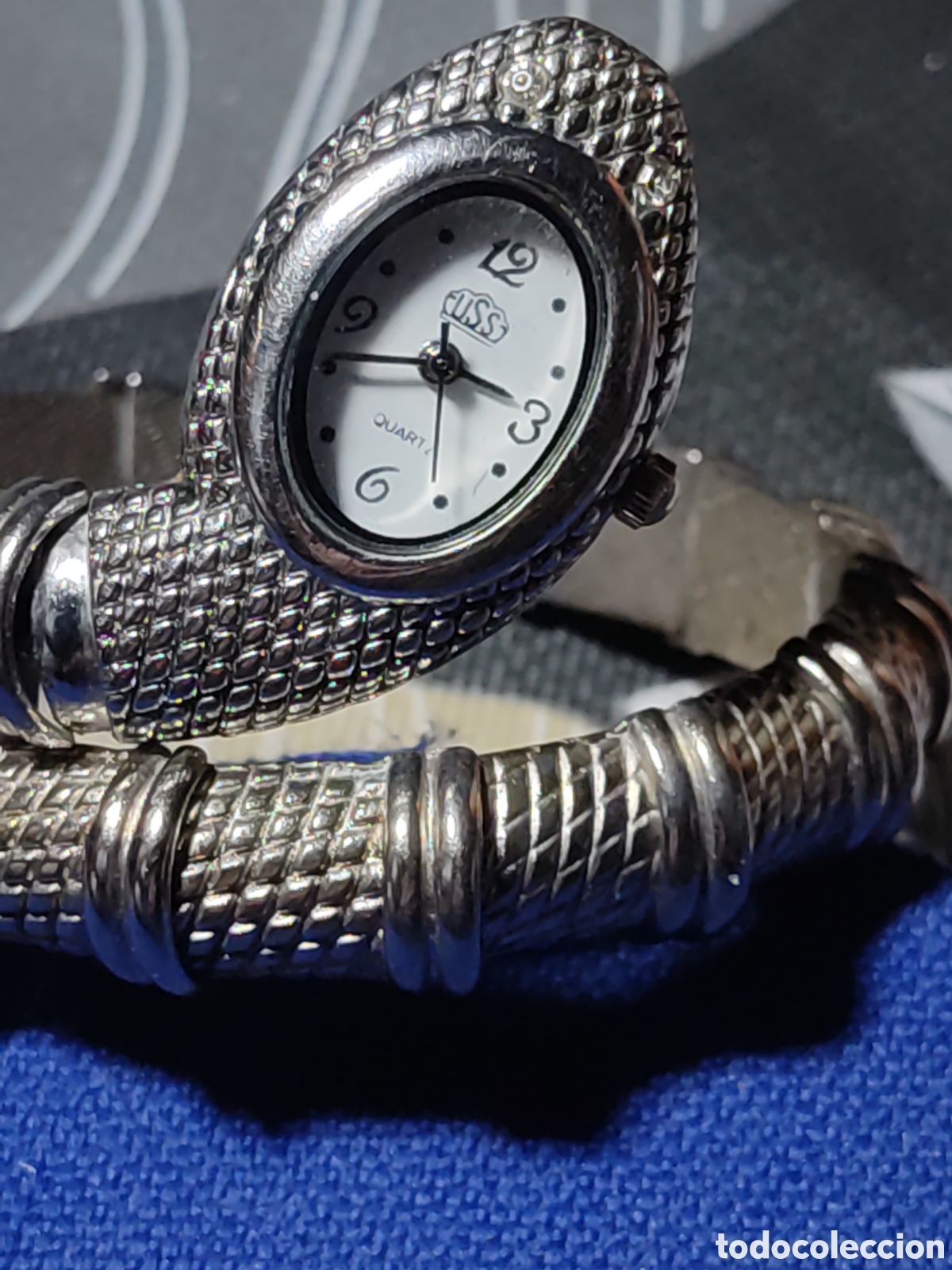 Vintage: Reloj plateado con forma de Serpiente.Vintage.
