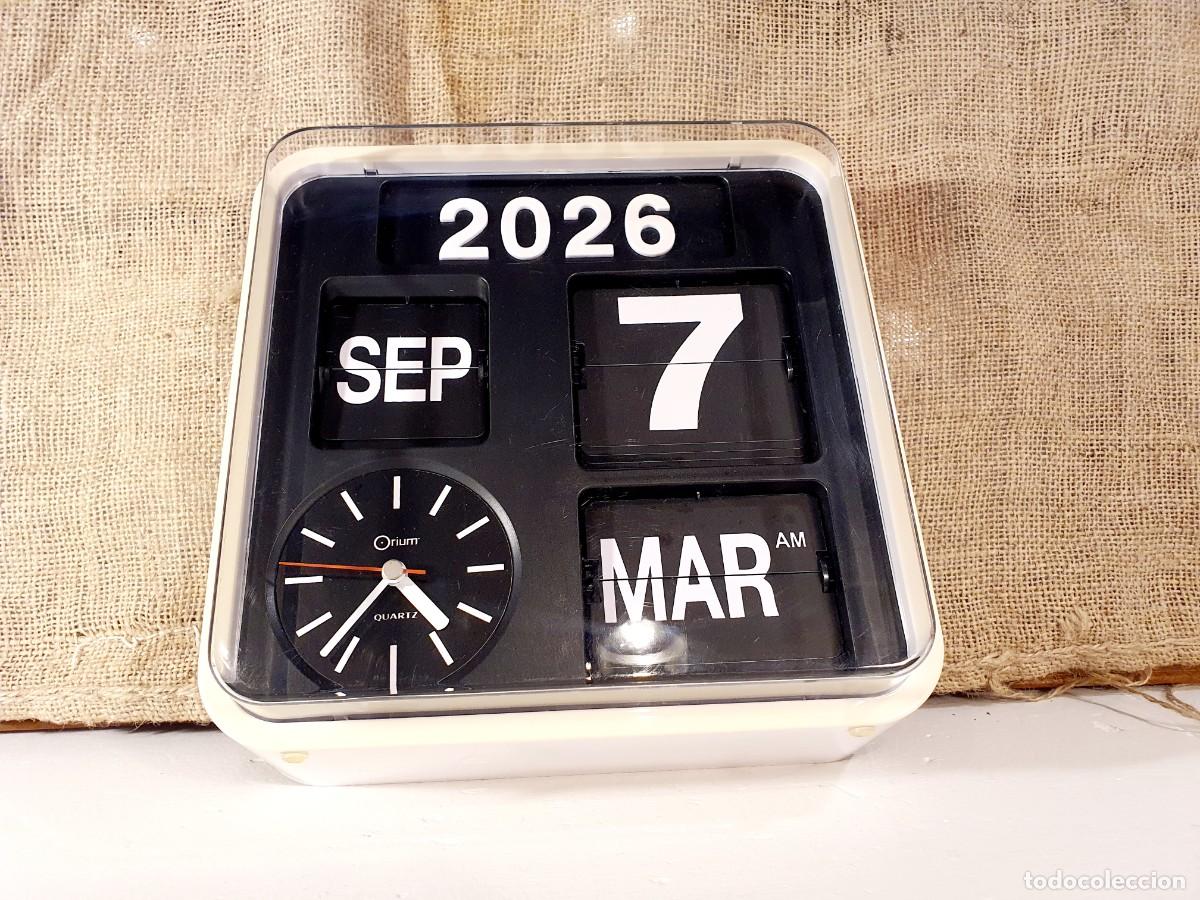 Vintage: Reloj flip Orium. Calendario. A&ntilde;os 90.