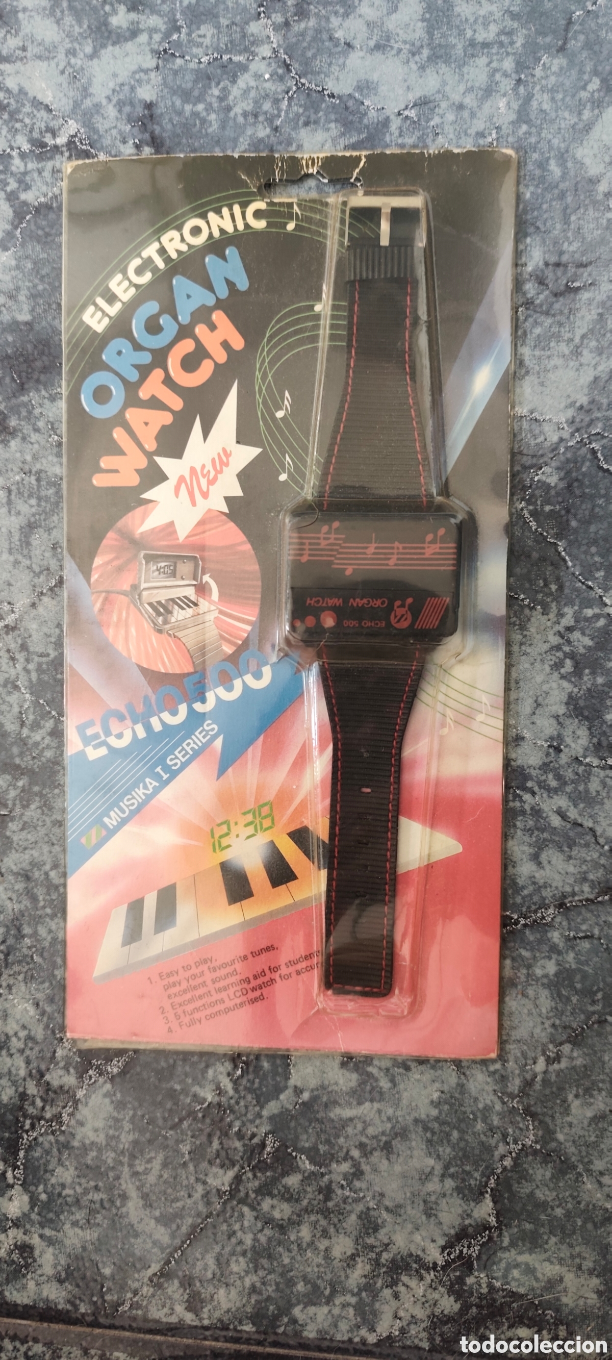Vintage: Reloj de pila con piano