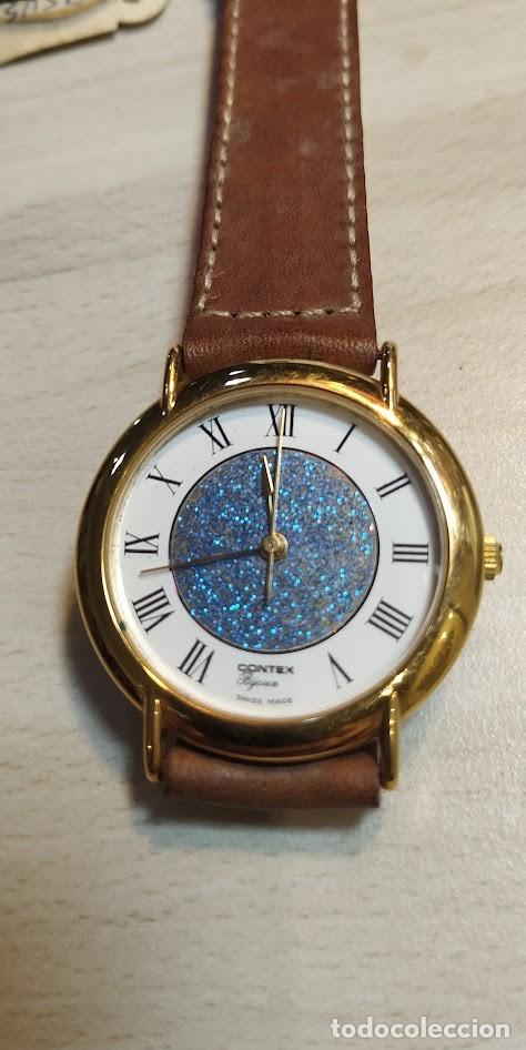 Vintage: relog Contex a&ntilde;os setenta esfera azul brillante a estrenar ,bateria nueva como se muestra en las fo