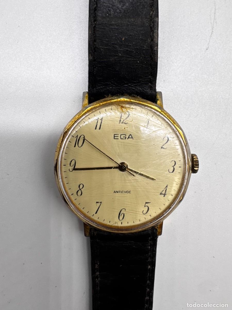 Vintage: RELOJ EGA ANTICHOC VINTAGE MEC&Aacute;NICO CARGA MANUAL DORADO CORREA NEGRA