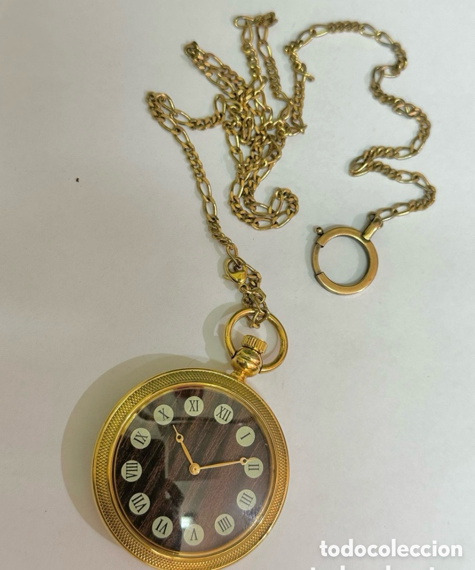 Vintage: Antiguo reloj de bolsillo con n&uacute;meros rumanos