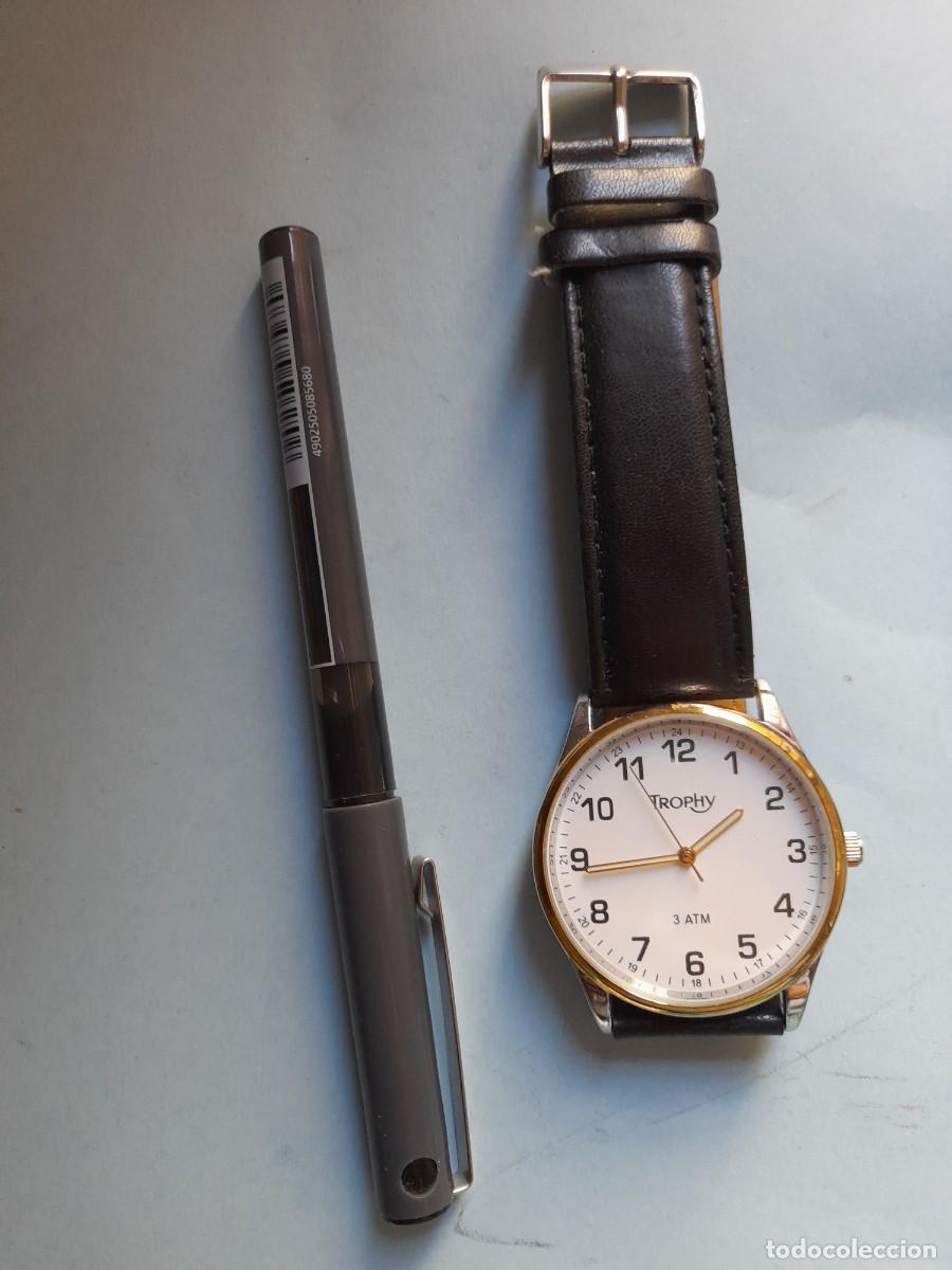 Vintage: Reloj caballero TROPHY con correa de piel negra.