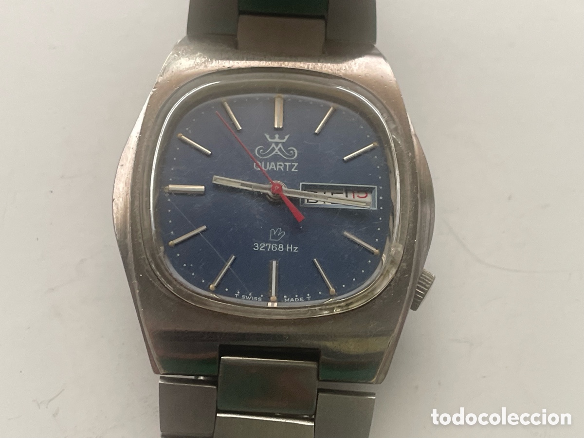 Vintage: Reloj Swiss Made Quartz 32768 Hz con d&iacute;a y fecha, esfera azul