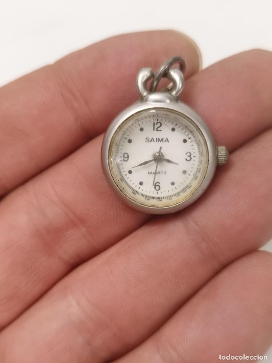 Vintage: Antiguo Peque&ntilde;o reloj colgante / bolsillo vintage SAIMA Quartz - Sin probar.