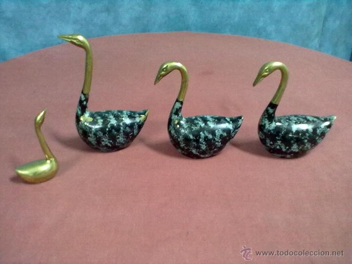 Vintage: CUATRO CISNES METAL