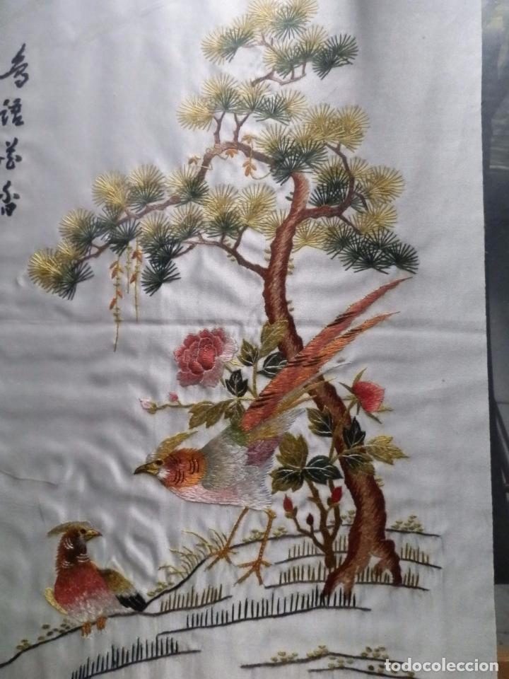 Vintage: DOS BORDADOS ORIENTALES,45X29,ENMARCADOS 63X48,S EN MOLDURA TIPO BAMBU EBONIZADO.