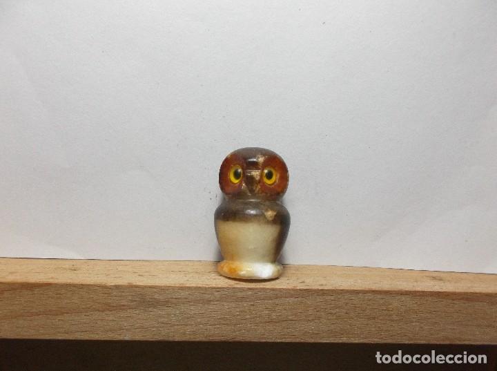  BUHO REALIZADO EN PIEDRA.