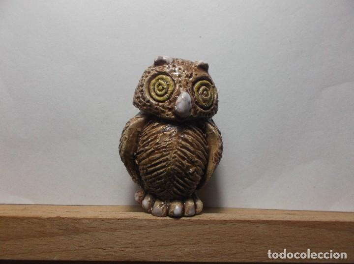 BUHO REALIZADO EN PIEDRA.