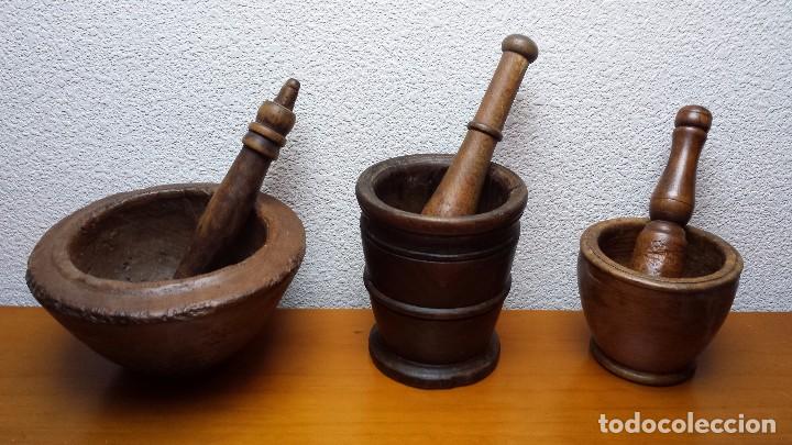 Vintage: morteros de madera con sus mazas.Muy antiguos.