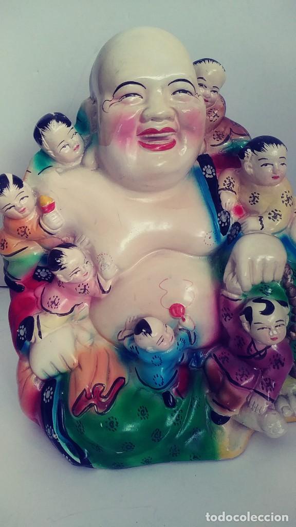 Vintage: figura del buda de la felicidad con siete ni&ntilde;os