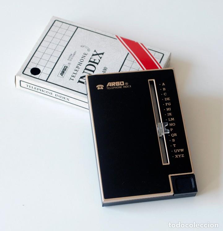 Vintage: List&iacute;n telef&oacute;nico de metal color negro con letras doradas. Marca Argo, Made in Taiwan. A&ntilde;os 80 Nuevo