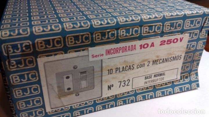 caja de 10 placas con 2 mecanismos