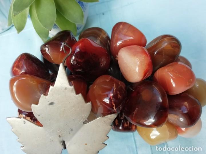 Vintage: Ramillete de uva tonos ocres, rosados y marrones