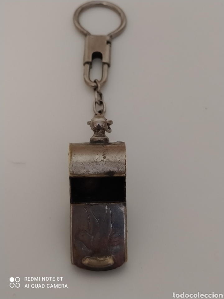 Vintage: Silbato de &aacute;rbitro met&aacute;lico con inscripci&oacute;n de una paloma