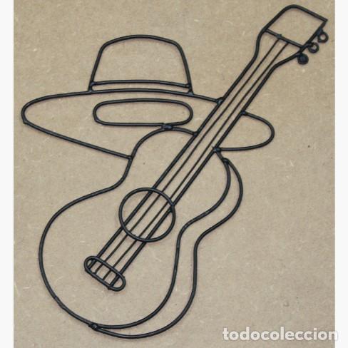 Vintage: Silueta guitarra y sombrero