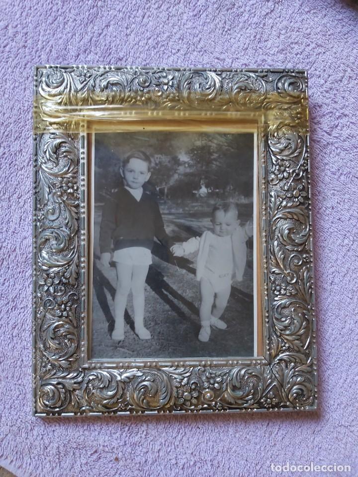 Vintage: Marco vintage para fotos con bonitas formas.