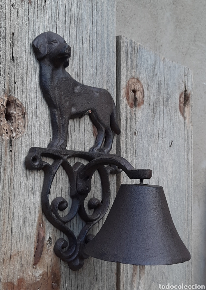 Vintage: Campana de hierro perro, calada