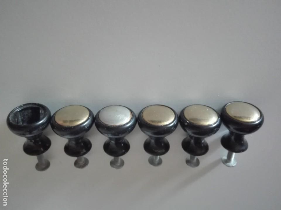 Vintage: Seis pomos vintage negros
