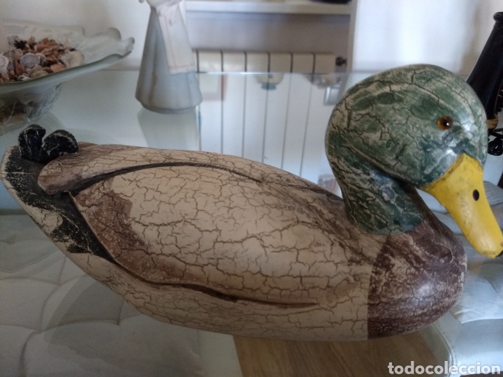 Patos de yeso pintado