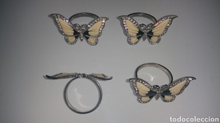 Vintage: Juego de servilleteros con forma de mariposas, realizado en metal plateado y esmaltado.