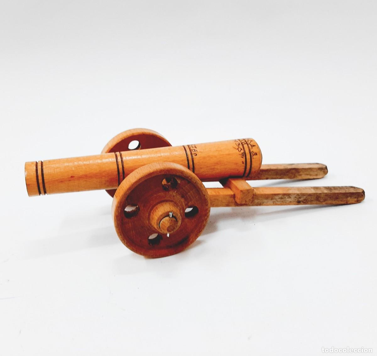 Vintage: Modelo de ca&ntilde;&oacute;n de madera tallada vintage (6.4)