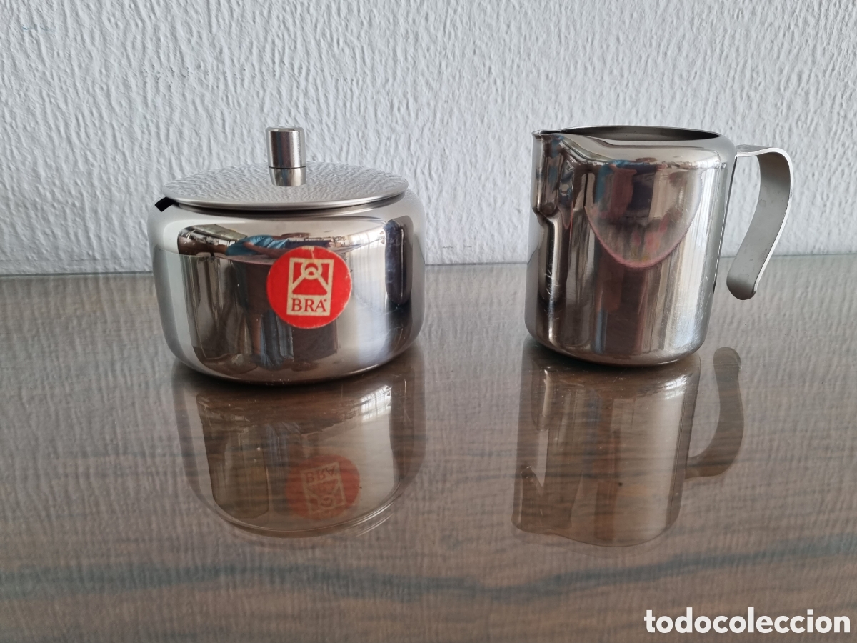 Vintage: Jarra de leche y azucarero nuevos. Bra. Inox.