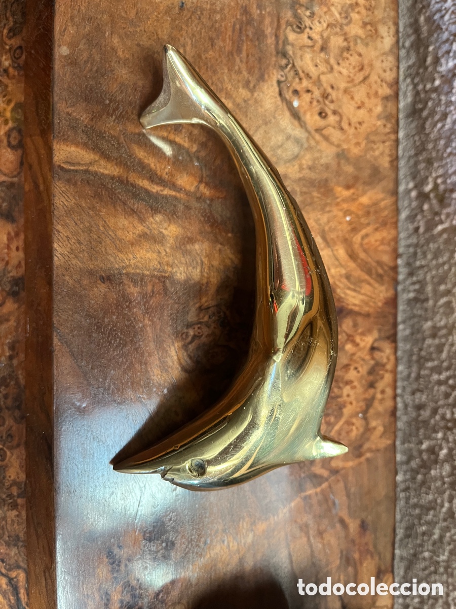 Vintage: Figura de delf&iacute;n en metal dorado.