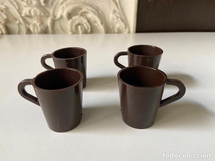 Vintage: 198.- Lote 4 vasos de sake en pl&aacute;stico. Made in Japan. 4 cm