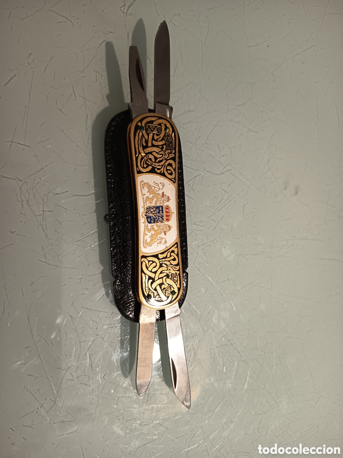 Vintage: Nava Eka dorada con funda.