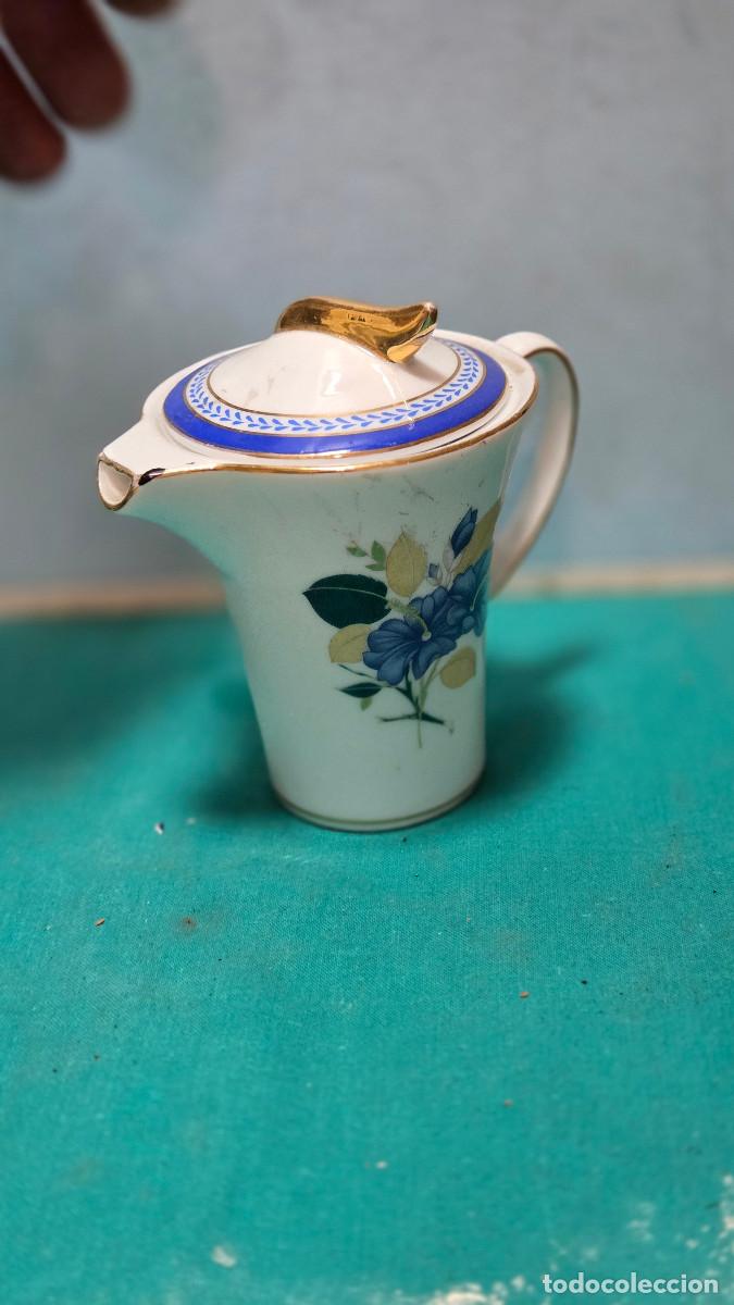 Vintage: jarra antigua con tapa