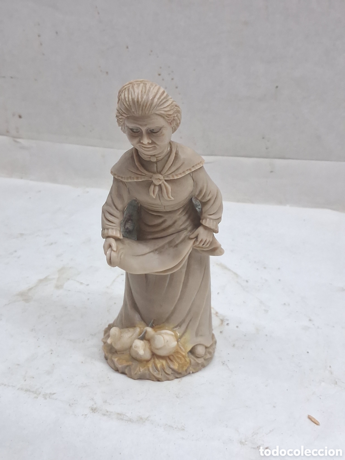Vintage: Se&ntilde;ora de resina con patos