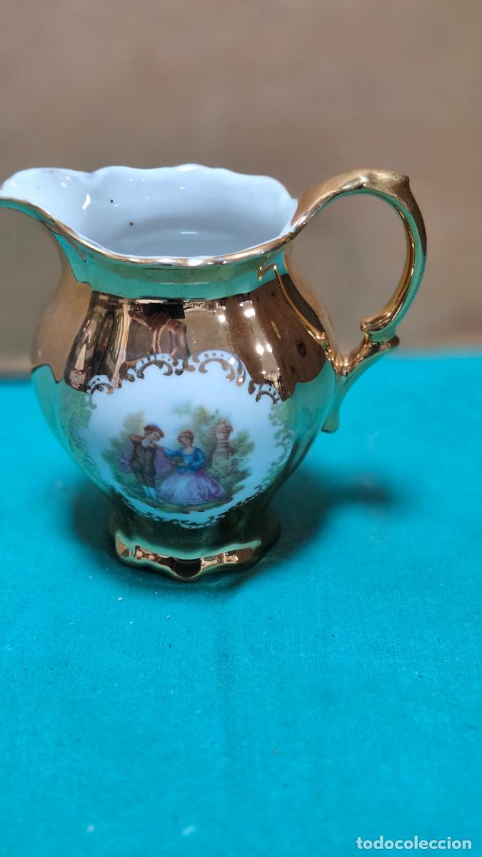 Vintage: jarra de porcelana dorada