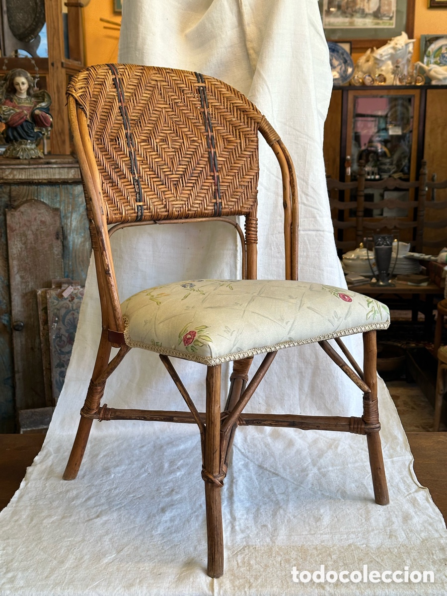 Vintage: Silla infantil vintage de rat&aacute;n y ca&ntilde;a de bamb&uacute;, estilo colonial. Tapizado floral.