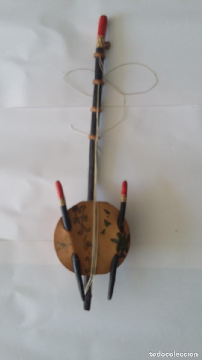 Vintage: instrumento (guitarra) artesanal africana