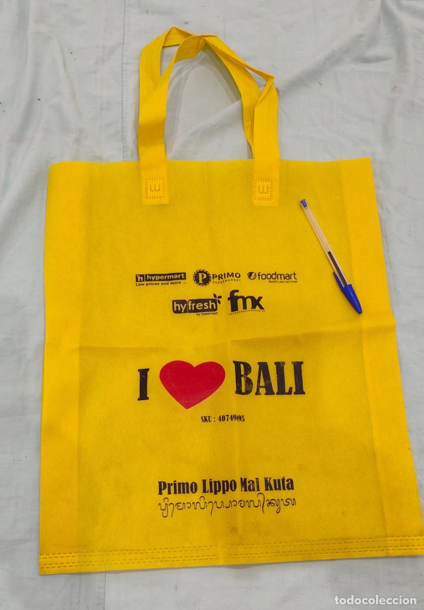 Vintage: Bali ,Indonesia ,bolsa tela amarilla de unos 38 x 45 ctms ,sin contar las asas.