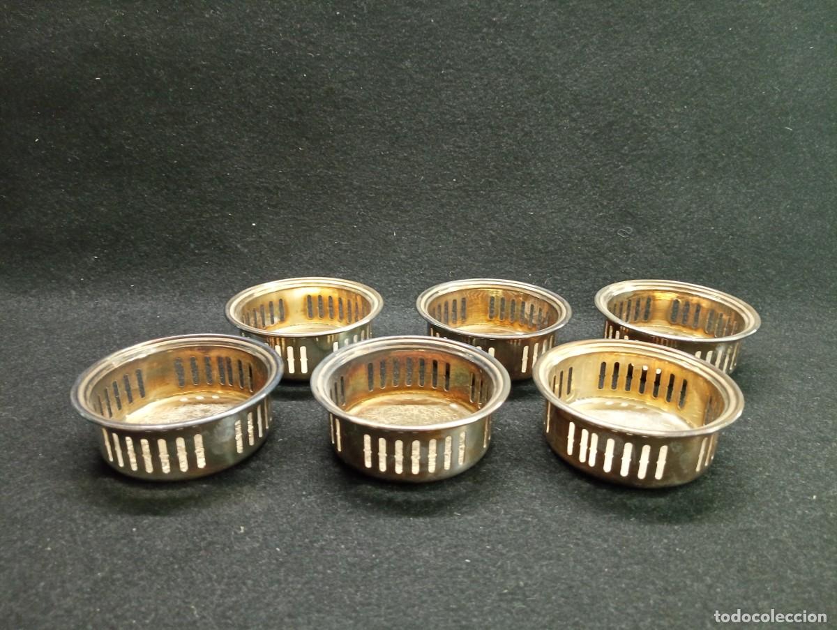 Vintage: Juego de 6 posavasos plateados de metal calado. A&ntilde;os 60.