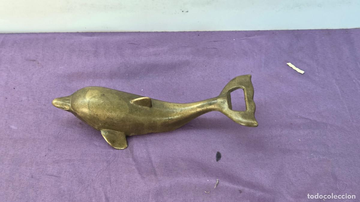Vintage: abrbotellas de metal delfin