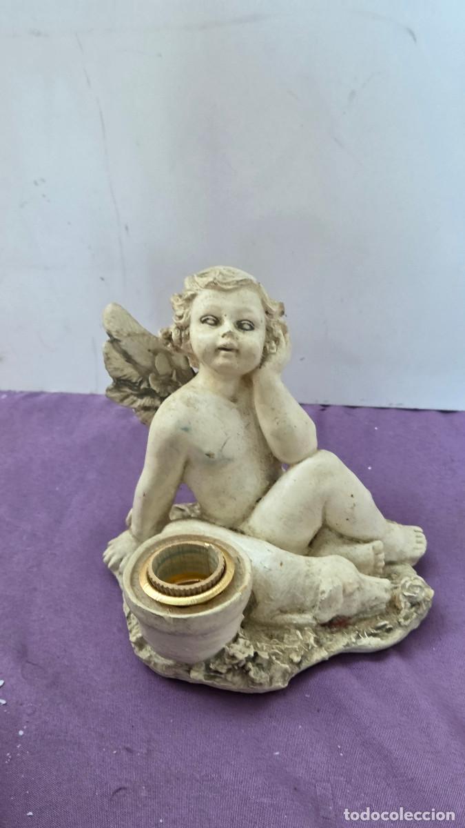figura de angel blanco