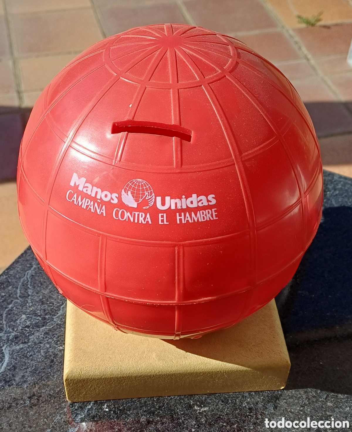 Vintage: Hucha globo Manos Unidas