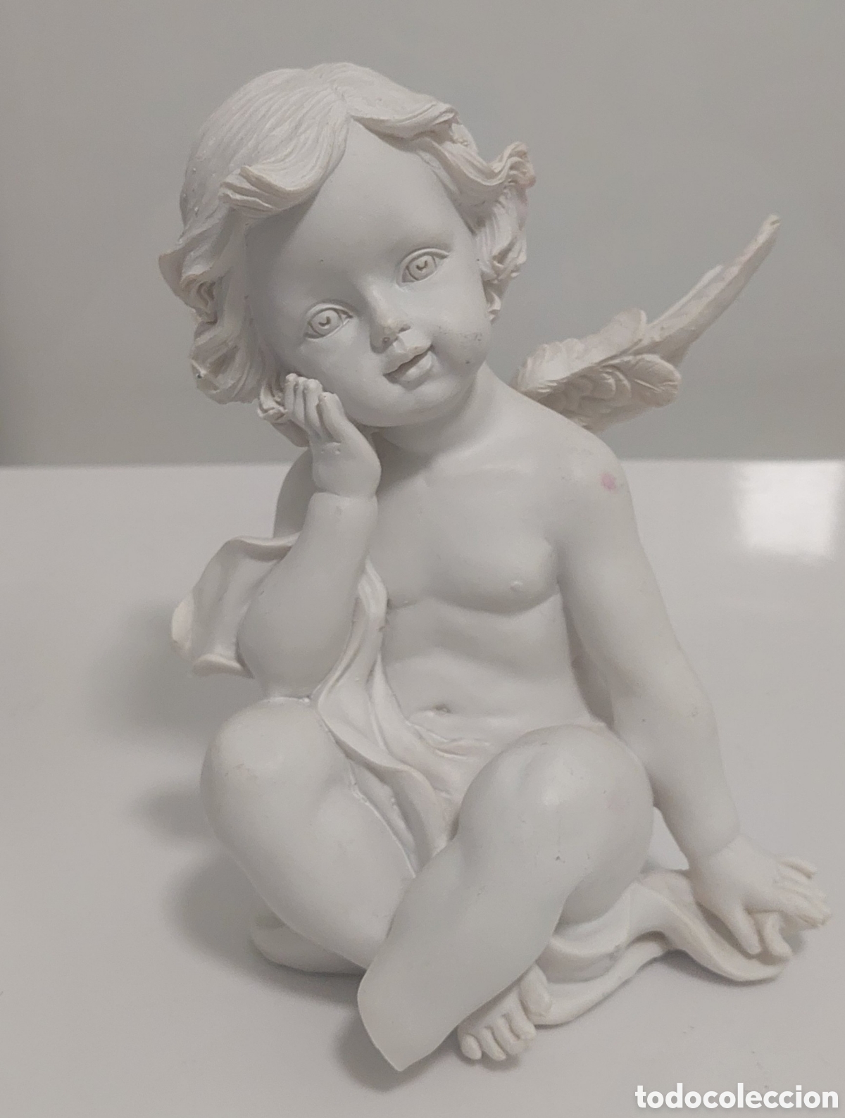 Vintage: Figura de angelito pensativo en resina