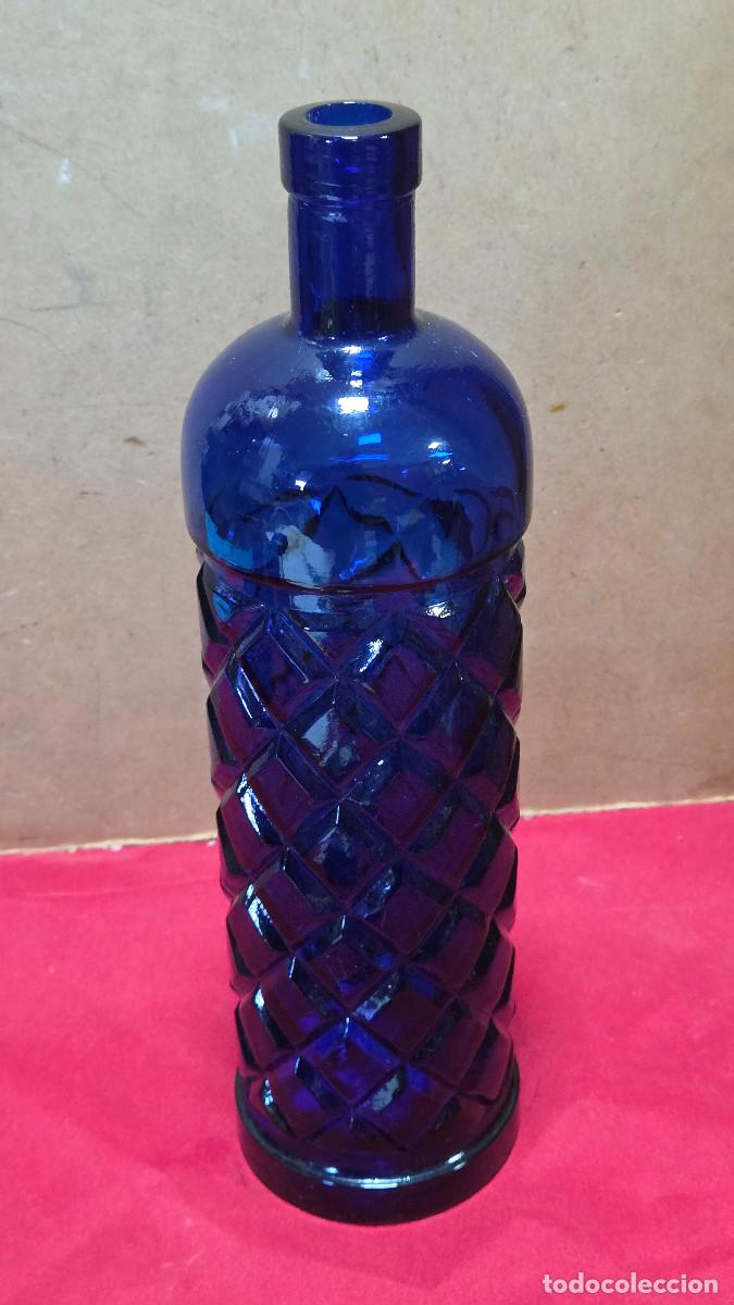 Vintage: botella de cristal azul