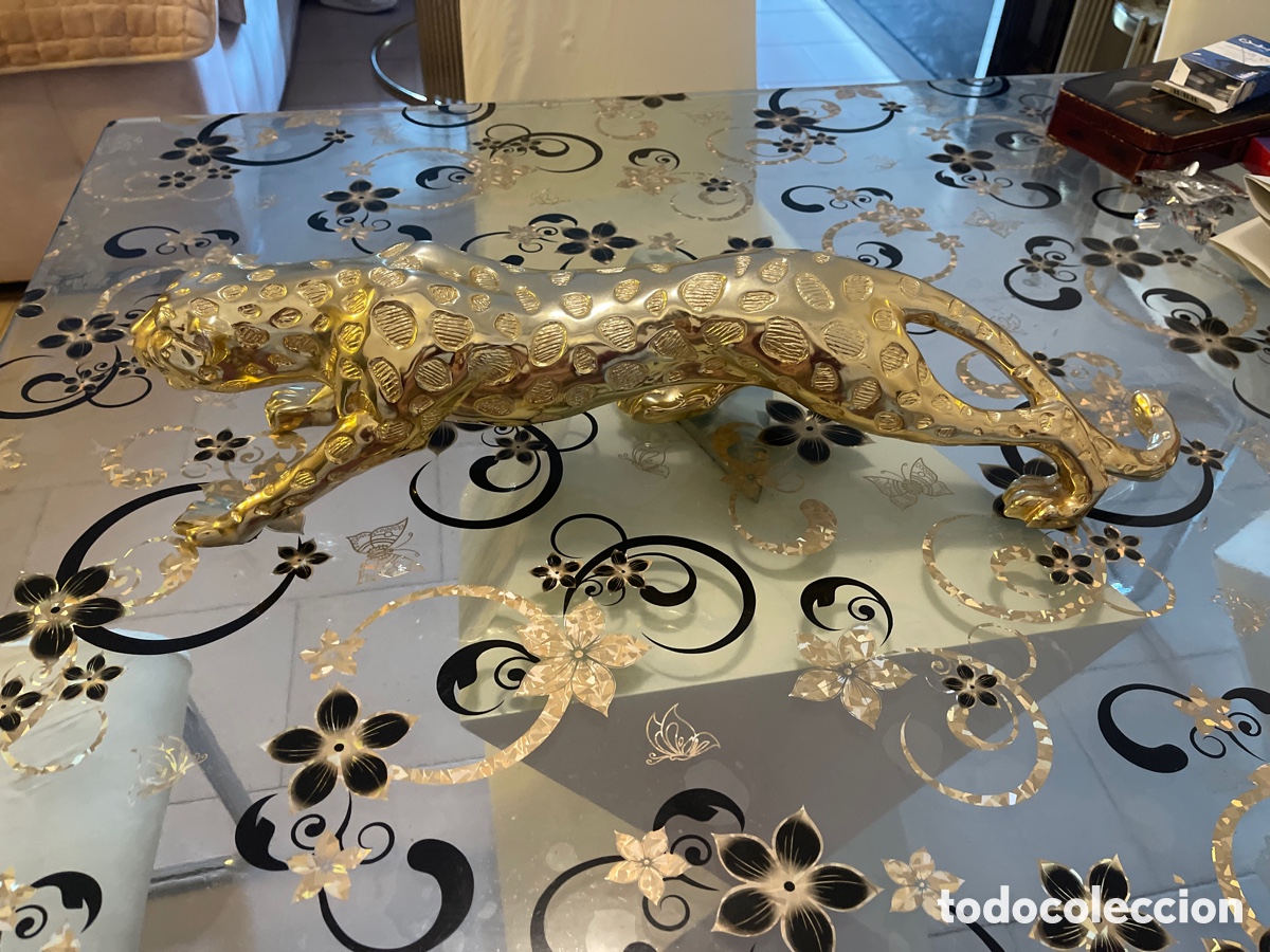 Vintage: figura decorativa dorada de un leopardo